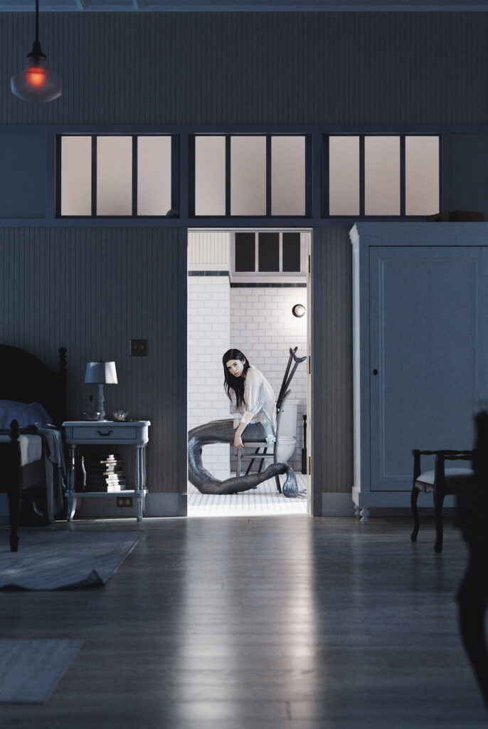 A woman with a long flowing tail sits on a chair in a dimly lit room with a doorway leading to a bathroom.